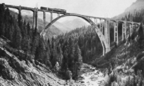 A COLOSSAL ARCH OF 350 FT. SPAN across the Plessur Valley