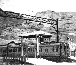 ON THE CAPE TOWN SUBURBAN LINE, a train at Monument Station