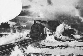 A German train encountering a wintry storm when crossing the Hindenburg Dam to the island of Sylt