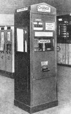 A CHANGE-GIVING MACHINE at an Underground station