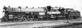 An early Canadian locomotive, “Trevithick”, standing by the Canadian National Railways’ 4-8-4 express engine “Confederation”