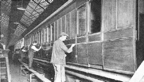 men at work “lining” a carriage at the LNER shops at York